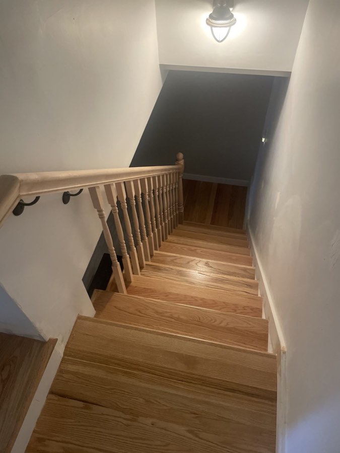 A newly rebuilt oak staircase with turned balusters